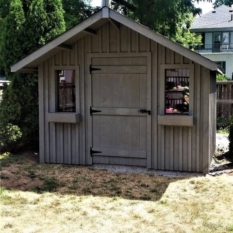 10 x 10 medium board and batten with a 2 foot gable overhang.