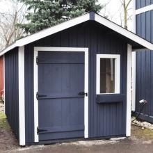 8 x 10 high board and batten with a 2 foot gable overhang.