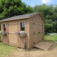 8 x 10 high board and batten with double doors and ramp.