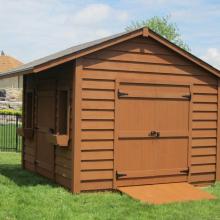 10 x 12 high classic with 2 foot side overhang and double doors.