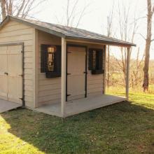 8 x 12 high classic  with a double doors, ramp and a 4 foot side porch.