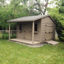 10 x 12 high classic  with double doors, ramp and a 4 foot side porch.